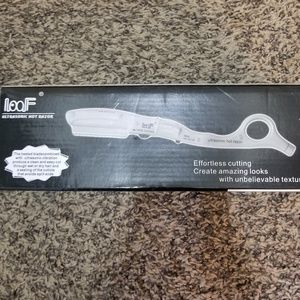 Ultrasonic hot razor